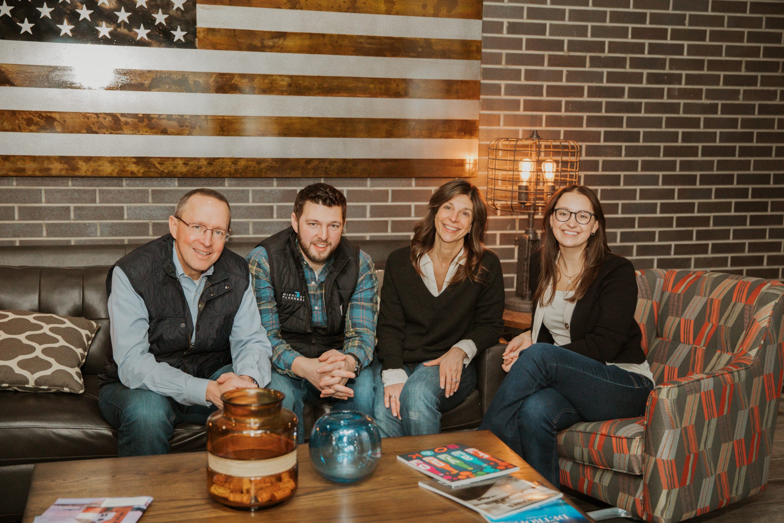 Members of the Michigan Planners team pose in the office